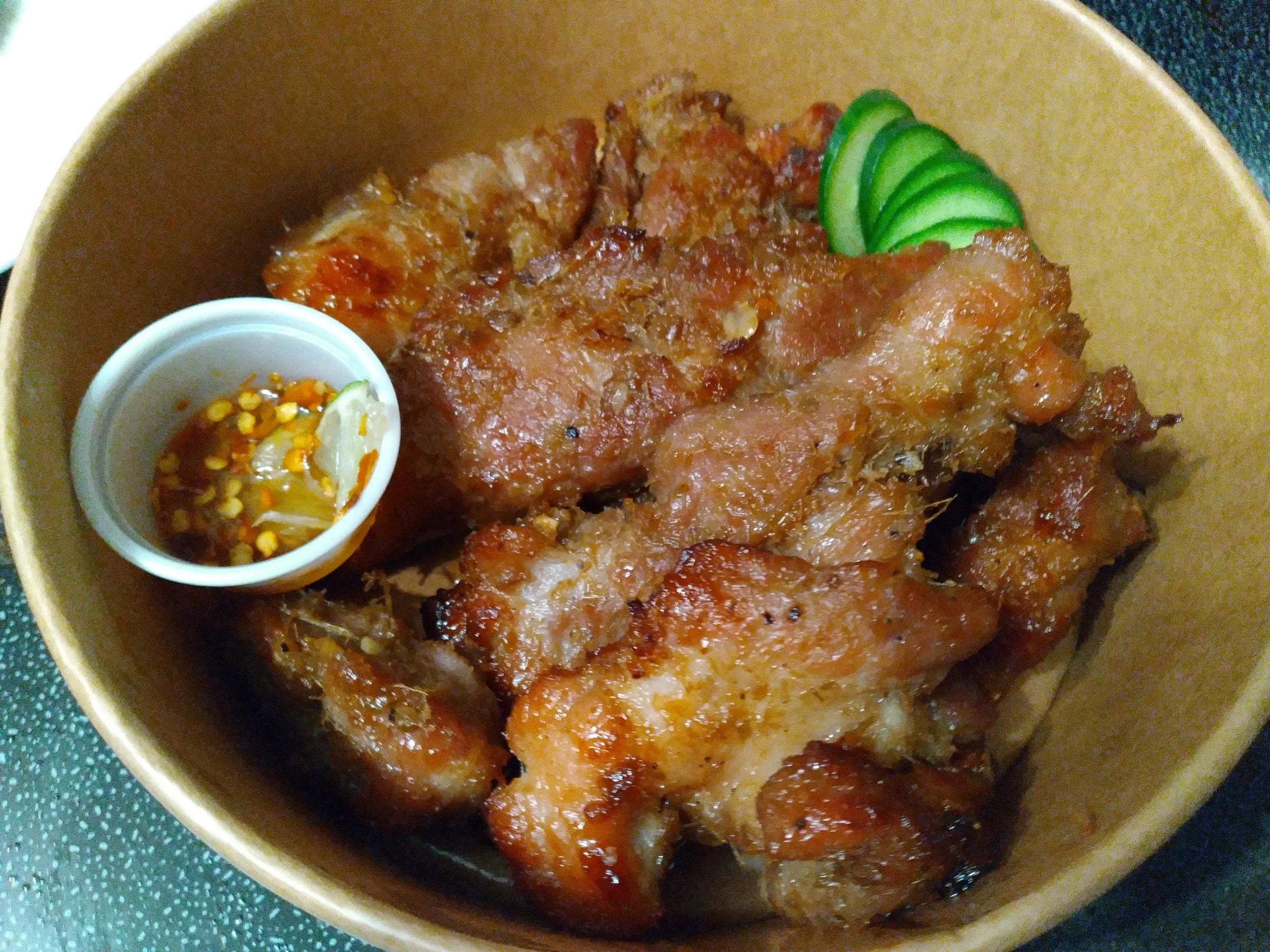 Cooked lemongrass pork in a bowl